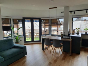 Modern top floor loft with balcony